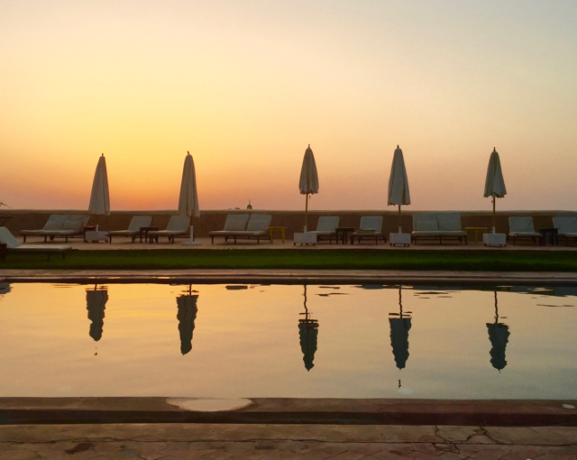 Yoga Explorers yoga retreat Marrakech. Sunset over the pool. 